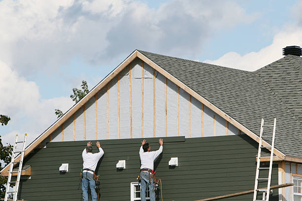 Professional Siding Contractor technician working in Richmond, VA